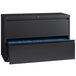 A black file cabinet with blue drawers.