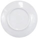 A white plate with a round rim.