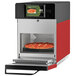 A pizza in a red ACP XpressChef 3i high-speed countertop oven.