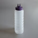 A clear plastic Vollrath Twin Tip wide mouth squeeze bottle with a purple cap.