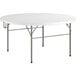 A Lancaster Table & Seating round white plastic folding table with metal legs.