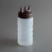 A Vollrath Tri Tip clear plastic squeeze bottle with a brown cap.