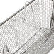 A metal FMP fryer basket divider.