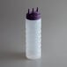 A clear plastic Vollrath Tri Tip squeeze bottle with a purple cap.