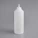 A white plastic bottle with a pointy tip.