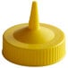 A yellow plastic Vollrath Traex bottle cap.