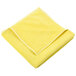 A yellow Unger SmartColor microfiber cloth folded on a white background.