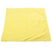 A yellow Unger SmartColor microfiber cloth on a white surface.