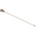 An antique copper-plated stainless steel Barfly classic bar spoon with a long handle.