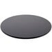 A black round table top on a white background.