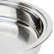 A close up of a Vollrath stainless steel food pan.