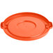 An orange plastic lid for a Lavex commercial trash can.