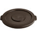 A brown round plastic lid for a Lavex commercial trash can.