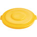A yellow plastic lid with a clear circle.