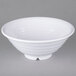 A white Carlisle melamine footed bowl.