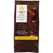 A package of Wilton Chocolate Pro Milk Chocolate Wafers with strawberries dipped in chocolate.