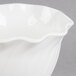 A white rectangular bowl with a wavy edge.