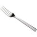 The Oneida Chef's Table Satin stainless steel dinner fork with a silver handle.