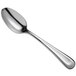 A Oneida Acclivity stainless steel European teaspoon with a silver handle and spoon.