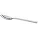 A silver Oneida Chef's Table serving spoon with a white background.