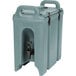 A large plastic Cambro insulated beverage dispenser in slate blue with a handle and a tap.