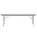 A white rectangular Correll folding table with a gray metal base.
