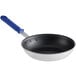 A Vollrath Wear-Ever aluminum non-stick fry pan with a blue handle.