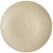 A close-up of a Tuxton Zion matte beige china plate.