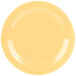 A yellow plate with a white curved line around the rim.