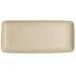 A rectangular white plate with a matte surface and embossed design.