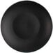 A black plate with a matte black circular design.
