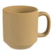 A close-up of a Tuxton TuxTrendz Zion matte beige mug with a handle.