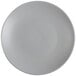 A close-up of a matte gray TuxTrendz Zion Coupe China Plate.