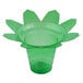 A green transparent plastic palm tree shaped snow cone cup.