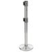 A close-up of a Lancaster Table & Seating chrome stanchion pole.
