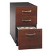 A Bush Hansen Cherry mobile file cabinet with an open drawer.