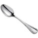 A Oneida Titian stainless steel coffee spoon with a silver handle and spoon.