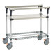 A Metro stainless steel cart with shelves on wheels.