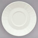 A Schonwald white porcelain saucer with a patterned white rim.