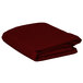 A folded burgundy rectangular cloth table cover on a white background.