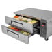 A Turbo Air stainless steel chef base with two drawers and two trays inside.