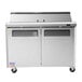 A Turbo Air stainless steel refrigerated sandwich prep table with 2 doors and 2 drawers.