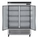 A silver Turbo Air reach-in freezer with two solid doors open.