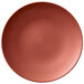 A Villeroy & Boch Copper Glow porcelain plate with a brown rim and spiral design.