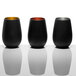 Three Stolzle matte black and gold stemless wine glasses on a white surface.