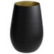 A black wine tumbler with a gold stem.