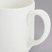 A Homer Laughlin bright white china mug with a handle.