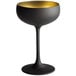 A Stolzle matte black wine glass with a gold rim and tall stem.