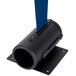 A black tube with a blue strap attached to it.