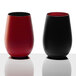 Two red and black Stolzle stemless wine glasses on a white surface.